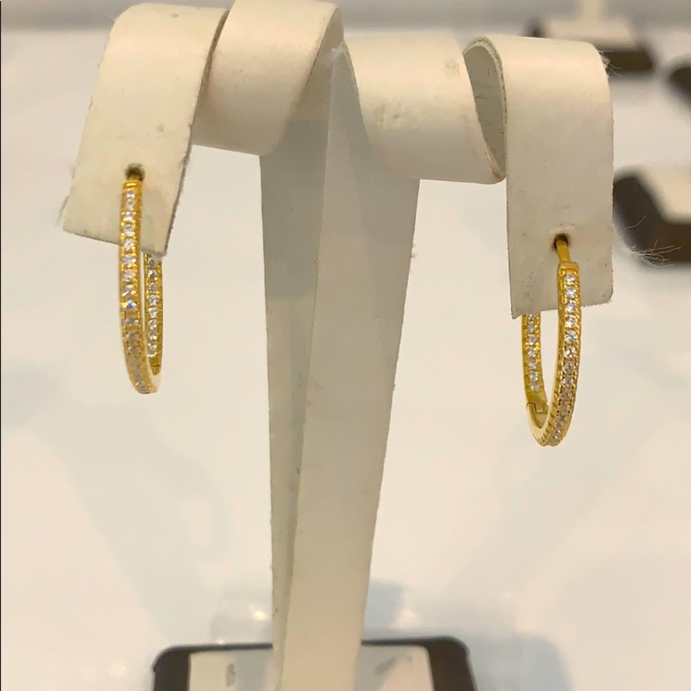 Sterling silver with cubic zirconium hoop earring